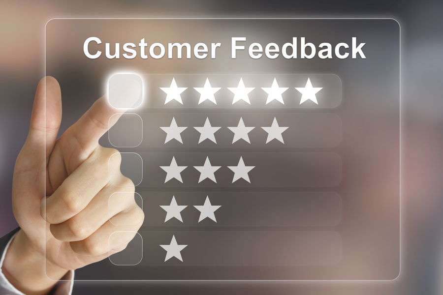 business hand pushing customer feedback on virtual screen